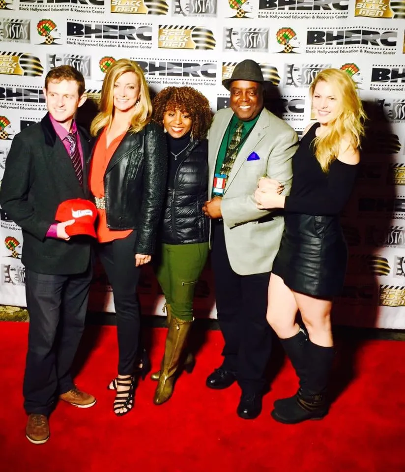 Sophia Thomas and four fellow My Name Is Lamar actors pose on the red carpet in front of a Black Hollywood Education & Resource Center backdrop.