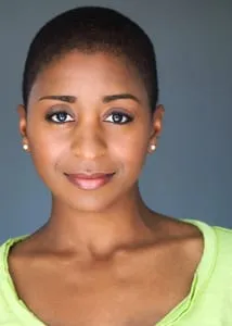 Headshot of Sophia Thomas with closely cropped hair and a lime-green top, star and co-producer of the short film No Place for Us.